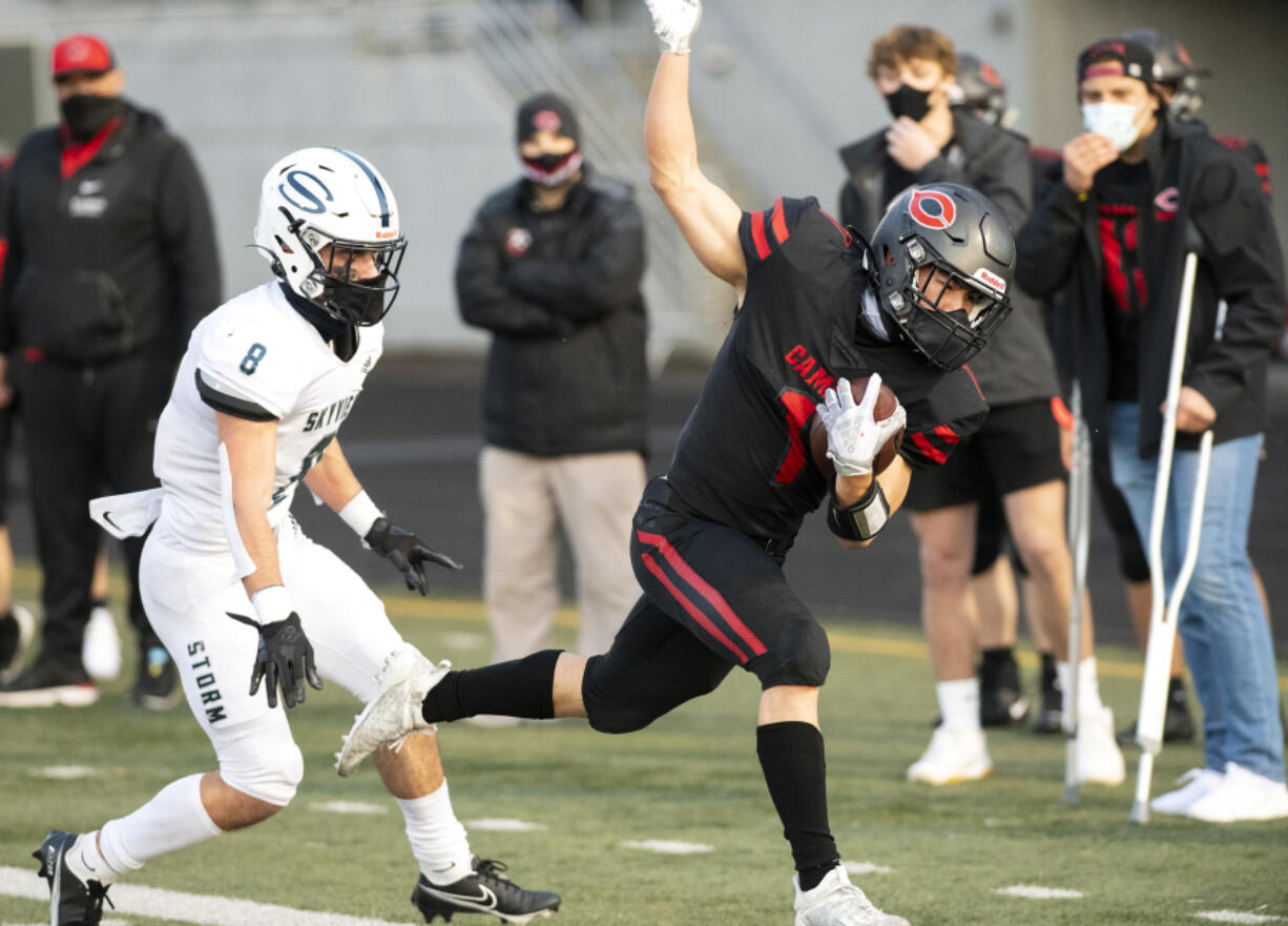 Skyview&#039;s Jaydin Knapp pushes Camas&#039; Gabe Guo out of bounds during the Papermakers&#039; 38-31 double-overtime win over the Storm on Tuesday night.