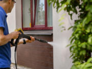 Pressure washing is a powerful tool to clean your house, driveway or decks, but it must be used carefully.