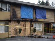 The aftermath of a fatal fire at Date Park Condominiums in Vancouver's Harney Heights neighborhood is pictured Wednesday morning.