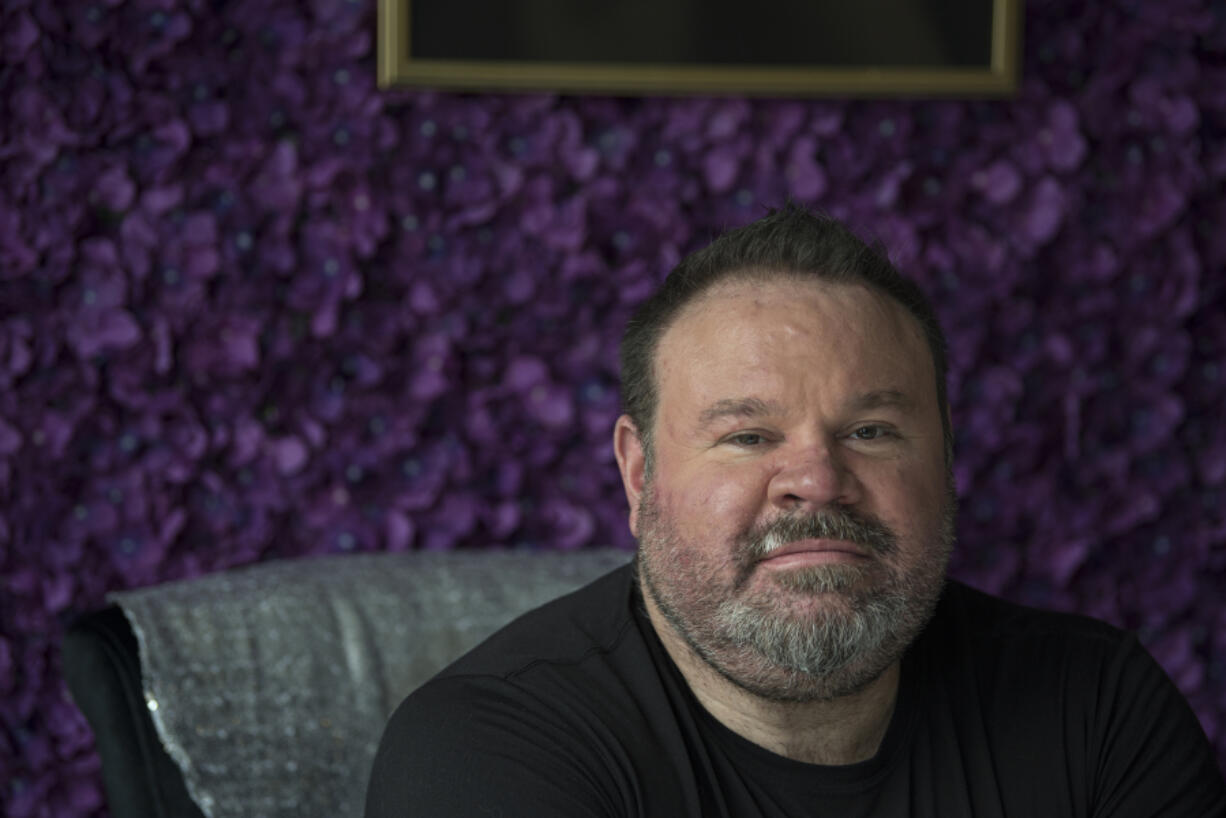 David Mucci of Vancouver pauses for a portrait at his home. Mucci, an interior designer, had his business impacted by the pandemic, and also contracted COVID-19. Months later, he still has symptoms.