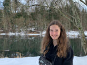 Katie Warner, 13, shown here with her camera near Salmon Creek, was recently named the American Birding Association's 2021 Young Birder of the Year.