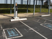 An electric vehicle charging station outside the Clark Public Utilities administration building. The utility&#039;s commission approved a Transportation Electrification plan Tuesday that will include multiple programs offering rebates for vehicle charging infrastructure.