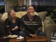 Terry Edwards, left, and Steve Edwards of Vancouver enjoy the sound of local singer-songwriter Aram Arslanian during a very regulated and distanced dinnertime show at Say Ciao! taproom and restaurant in Vancouver.