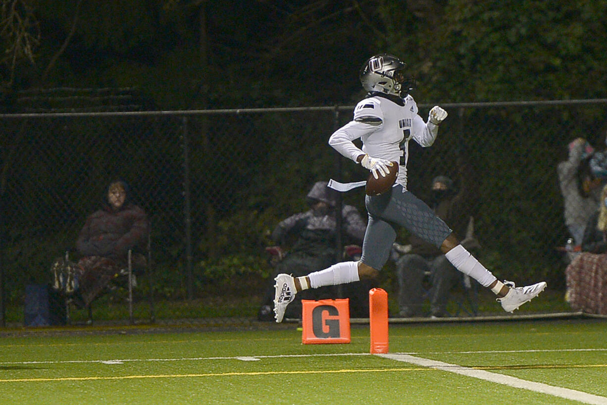 Union's Tobias Merriweather scores a touchdown against Skyview at Kiggins Bowl on Friday night, March 12, 2021.