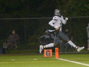 Union's Tobias Merriweather scores a touchdown against Skyview at Kiggins Bowl on Friday night, March 12, 2021.