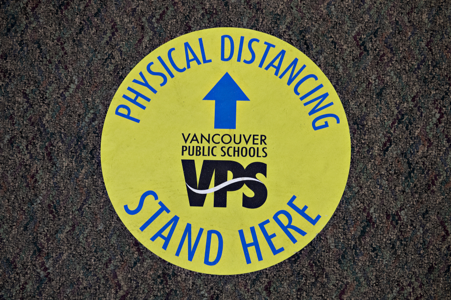 Signs and stickers encourage students and staff to remain social distanced throughout the building at Skyview High School, Vancouver Public Schools&#039; largest high school.