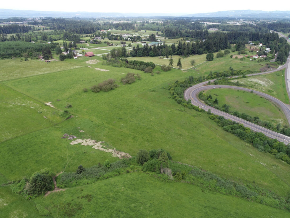 Aerial photos from PBS Engineering and Environmental show the Northeast 219th Street interchange as it exists currently, with only an eastern connection toward Battle Ground. Ridgefield is in the early planning stages of a project that would extend the road to the west, creating a new freeway connection to the south of the city.