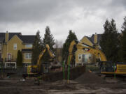 Construction begins on Riverside Townhomes, a town house complex proposed for a long-vacant lot at 1770 S.E. Columbia River Drive. Each is about 2,500 square feet with a two-car garage on the bottom floor. They&#039;re set to be completed between spring and summer 2022.
