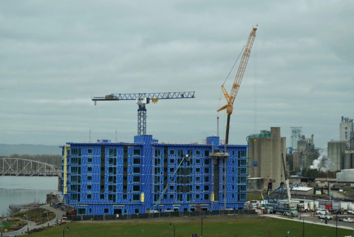 The tower crane on The Columbia Apartments at The Waterfront Vancouver&#039;s Block 20 came down Friday. The building is scheduled to be finished in November.