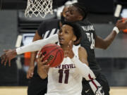 Arizona State's Alonzo Verge Jr. (11) shoots around Washington State's Noah Williams (24) during the second half of an NCAA college basketball game in the first round of the Pac-12 men's tournament Wednesday, March 10, 2021, in Las Vegas.