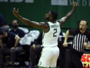 Oregon forward Eugene Omoruyi (2) celebrates after making a three-point basket against Arizona during the first half of an NCAA college basketball game Monday, March 1, 2021, in Eugene, Ore.