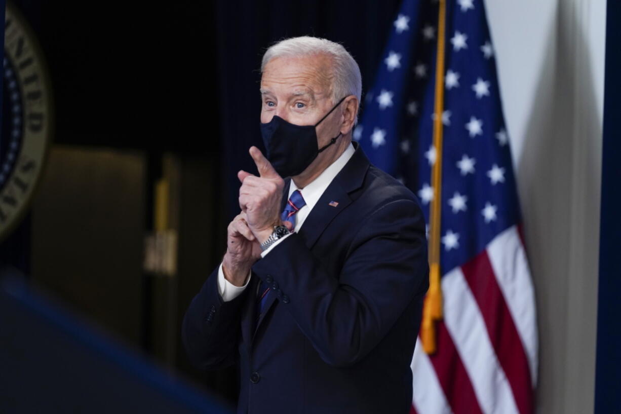 President Joe Biden looks on after speaking during an event to mark Equal Pay Day in the South Court Auditorium in the Eisenhower Executive Office Building on the White House Campus Wednesday, March 24, 2021, in Washington.