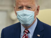 FILE - In this Feb. 11, 2021, file photo President Joe Biden speaks during a meeting with lawmakers on investments in infrastructure, in the Oval Office of the White House in Washington. Biden and Democrats in Congress are jamming their agenda forward with a sense of urgency. They&#039;re taking an unapologetically partisan approach to advance the $1.9 trillion COVID-19 rescue, voting rights and other priorities. Their calculation is that it&#039;s better to try to push ahead than risk wasting time courting Republican support that may never come.