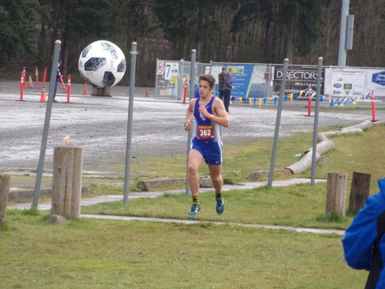 La Center's Joseph Blanshan runs in the 1A district cross country meet at Harmony Sports Complex on March 19, 2021 (Tim Martinez/The Columbian)