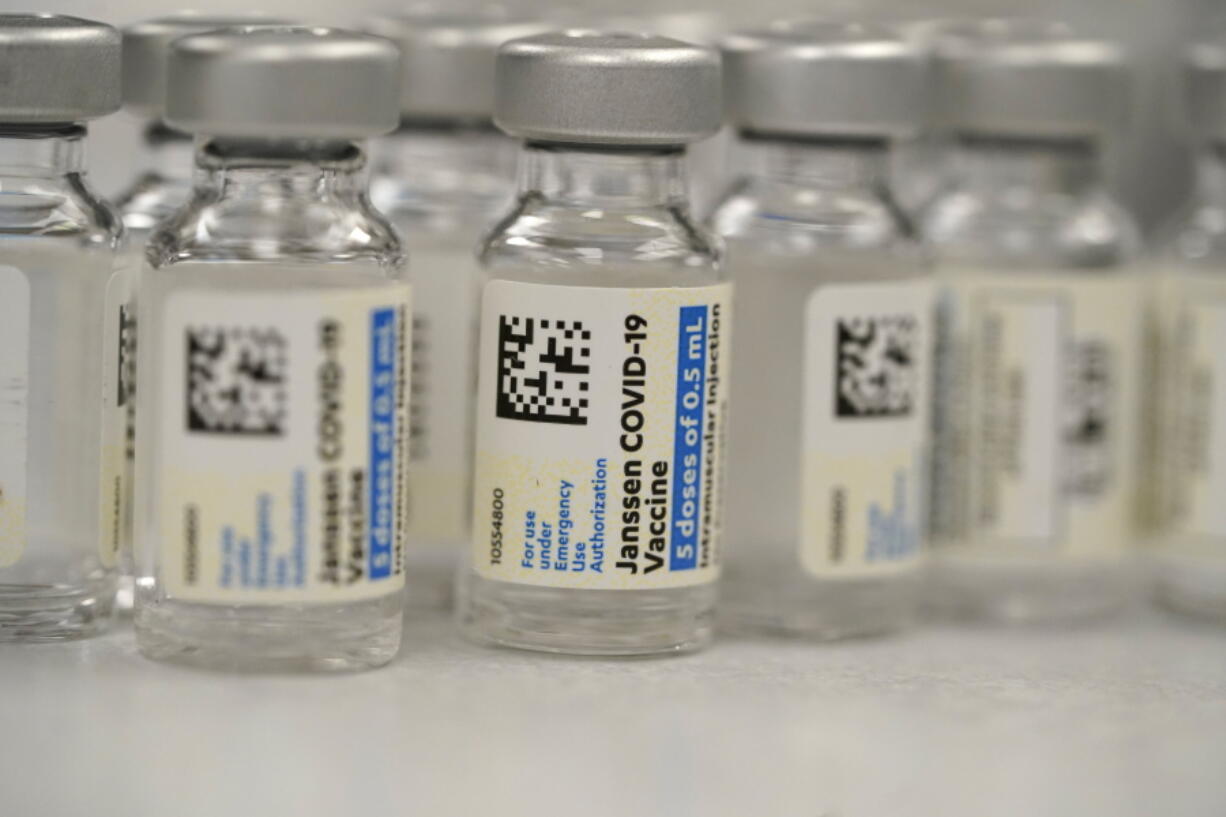 FILE - This Saturday, March 6, 2021 file photo shows vials of Johnson &amp; Johnson COVID-19 vaccine in the pharmacy of National Jewish Hospital for distribution in east Denver. The European Medicines Agency is meeting Thursday March 11, 2021, to discuss whether Johnson &amp; Johnson&#039;s one-dose coronavirus vaccine should be authorized, a move that would give the European Union a fourth licensed vaccine to try to curb the pandemic amid a stalled inoculation drive.