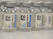 FILE - This Saturday, March 6, 2021 file photo shows vials of Johnson &amp; Johnson COVID-19 vaccine in the pharmacy of National Jewish Hospital for distribution in east Denver. The European Medicines Agency is meeting Thursday March 11, 2021, to discuss whether Johnson &amp; Johnson&#039;s one-dose coronavirus vaccine should be authorized, a move that would give the European Union a fourth licensed vaccine to try to curb the pandemic amid a stalled inoculation drive.