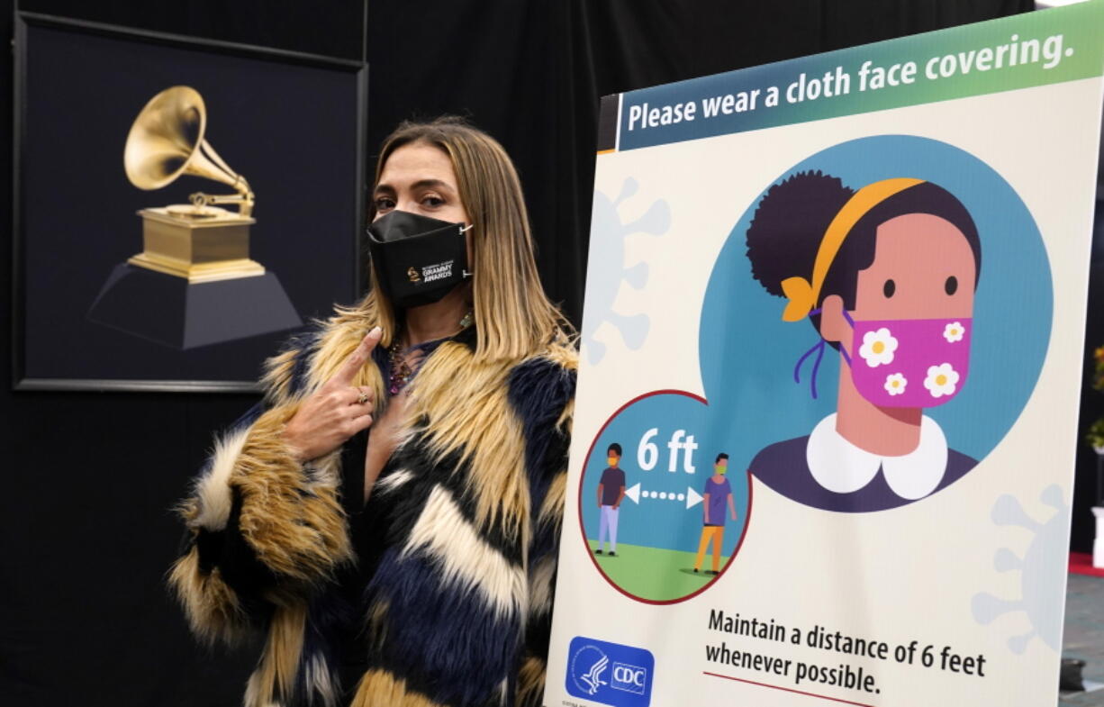 Associated Press entertainment reporter Marcela Isaza poses backstage at the 63rd Grammy Awards at the Los Angeles Convention Center, Thursday, March 11, 2021. The awards show will air on Sunday.