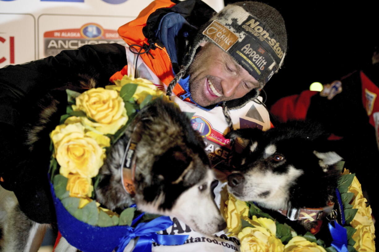 Thomas Waerner, of Norway, celebrates his win in the 2020 Iditarod Trail Sled Dog Race in Nome, Alaska. The world&#039;s most famous sled dog race starts Sunday, March 7, 2021, without its defending champion in a contest that will be as much dominated by unknowns and changes because of the pandemic as mushers are by the Alaska terrain.