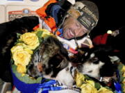 Thomas Waerner, of Norway, celebrates his win in the 2020 Iditarod Trail Sled Dog Race in Nome, Alaska. The world&#039;s most famous sled dog race starts Sunday, March 7, 2021, without its defending champion in a contest that will be as much dominated by unknowns and changes because of the pandemic as mushers are by the Alaska terrain.