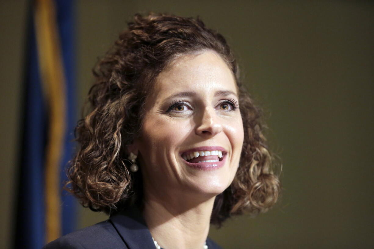 FILE - In this Jan. 21, 2021, file photo, Julia Letlow, widow of Republican U.S. Rep.-elect Luke Letlow, speaks to reporters in Baton Rouge, La., after signing up to run for the 5th District seat. Three months after Louisiana voters determined the state&#039;s congressional lineup, the presidential election and the coronavirus pandemic are forcing a new round of elections Saturday for two of those U.S. House seats. Julia Letlow is the front-runner among 12 candidates in the race, with the backing of Donald Trump and the state GOP in a deep red district and more money raised than all her competitors combined.