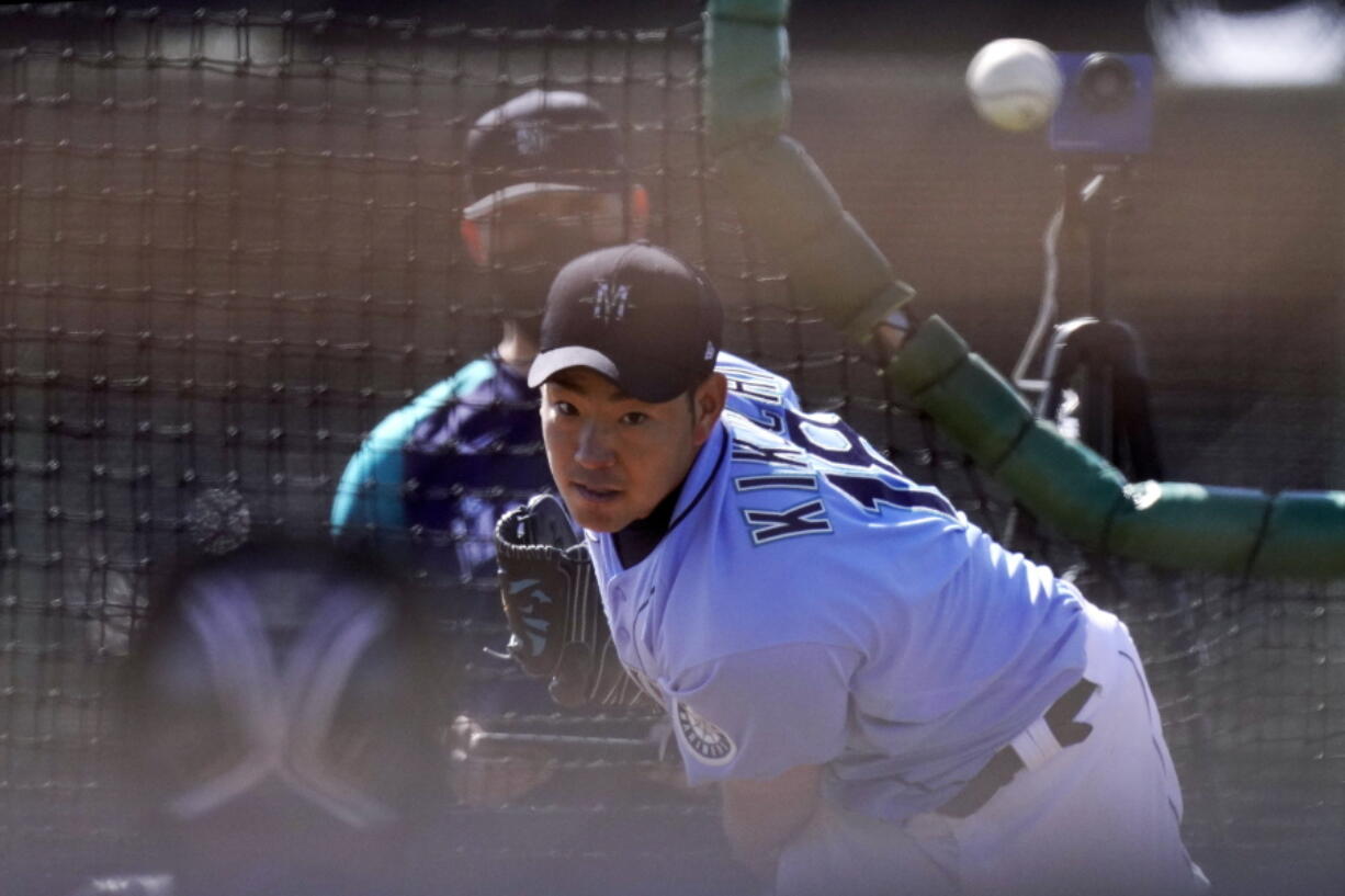 Seattle Mariners pitcher Yusei Kikuchi throws during baseball spring training Thursday, Feb. 25, 2021, in Peoria, Ariz.