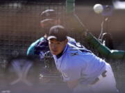 Seattle Mariners pitcher Yusei Kikuchi throws during baseball spring training Thursday, Feb. 25, 2021, in Peoria, Ariz.