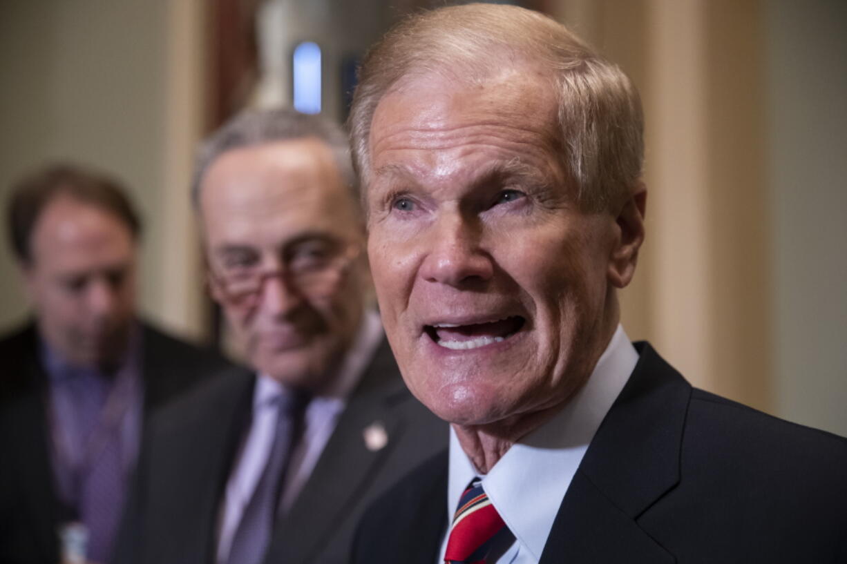 FILE - In this Nov. 13, 2018 file photo, Sen. Bill Nelson, D-Fla., attends a news conference at the Capitol in Washington.  President Joe Biden has chosen Nelson, a former senator from Florida who flew on the space shuttle to lead NASA. Biden announced his intent Friday, March 19, 2021.(AP Photo/J.