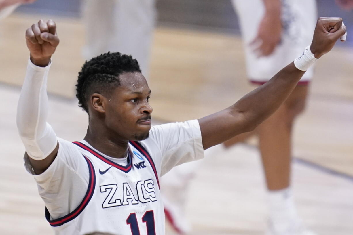 Gonzaga guard Joel Ayayi (11) reacts to a play against Creighton in the first half of a Sweet 16 game in the NCAA men&#039;s college basketball tournament at Hinkle Fieldhouse in Indianapolis, Sunday, March 28, 2021.