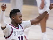 Gonzaga guard Joel Ayayi (11) reacts to a play against Creighton in the first half of a Sweet 16 game in the NCAA men&#039;s college basketball tournament at Hinkle Fieldhouse in Indianapolis, Sunday, March 28, 2021.