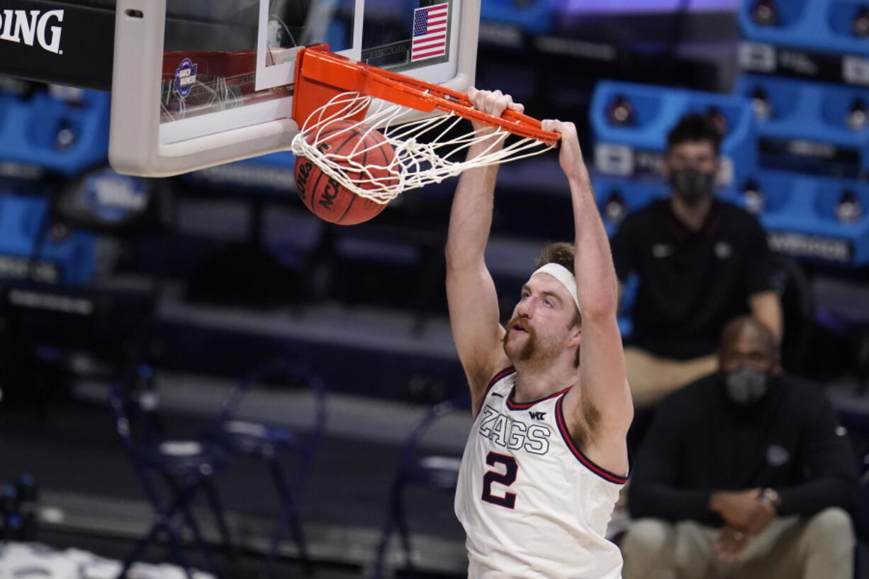 Gonzaga forward Drew Timme (2) dunks against Creighton in the second half of a Sweet 16 game in the NCAA men&#039;s college basketball tournament at Hinkle Fieldhouse in Indianapolis, Sunday, March 28, 2021.