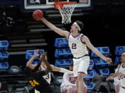 Gonzaga forward Drew Timme (2) blocks a Norfolk State guard Jalen Hawkins (24) shot during the first half of a men&#039;s college basketball game in the first round of the NCAA tournament at Bankers Life Fieldhouse in Indianapolis, Saturday, March 20, 2021.