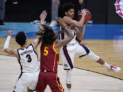 Gonzaga guard Aaron Cook, grabs a rebound over Southern California guard Isaiah White (5) during the first half of an Elite 8 game in the NCAA men&#039;s college basketball tournament at Lucas Oil Stadium, Tuesday, March 30, 2021, in Indianapolis.