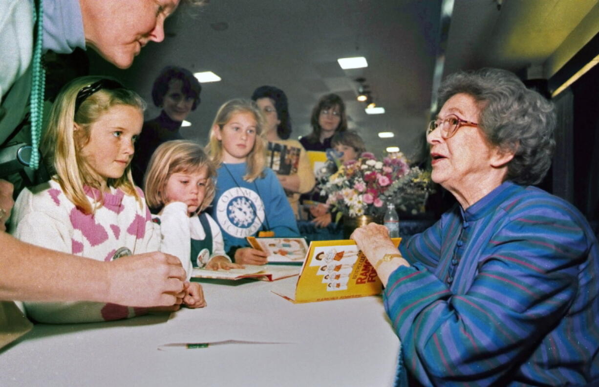 Beverly Cleary signs books in 1998 at the Monterey Bay Book Festival in Monterey, Calif. The beloved children&#039;s author, whose characters Ramona Quimby and Henry Huggins enthralled generations of youngsters, died last week. She was 104.