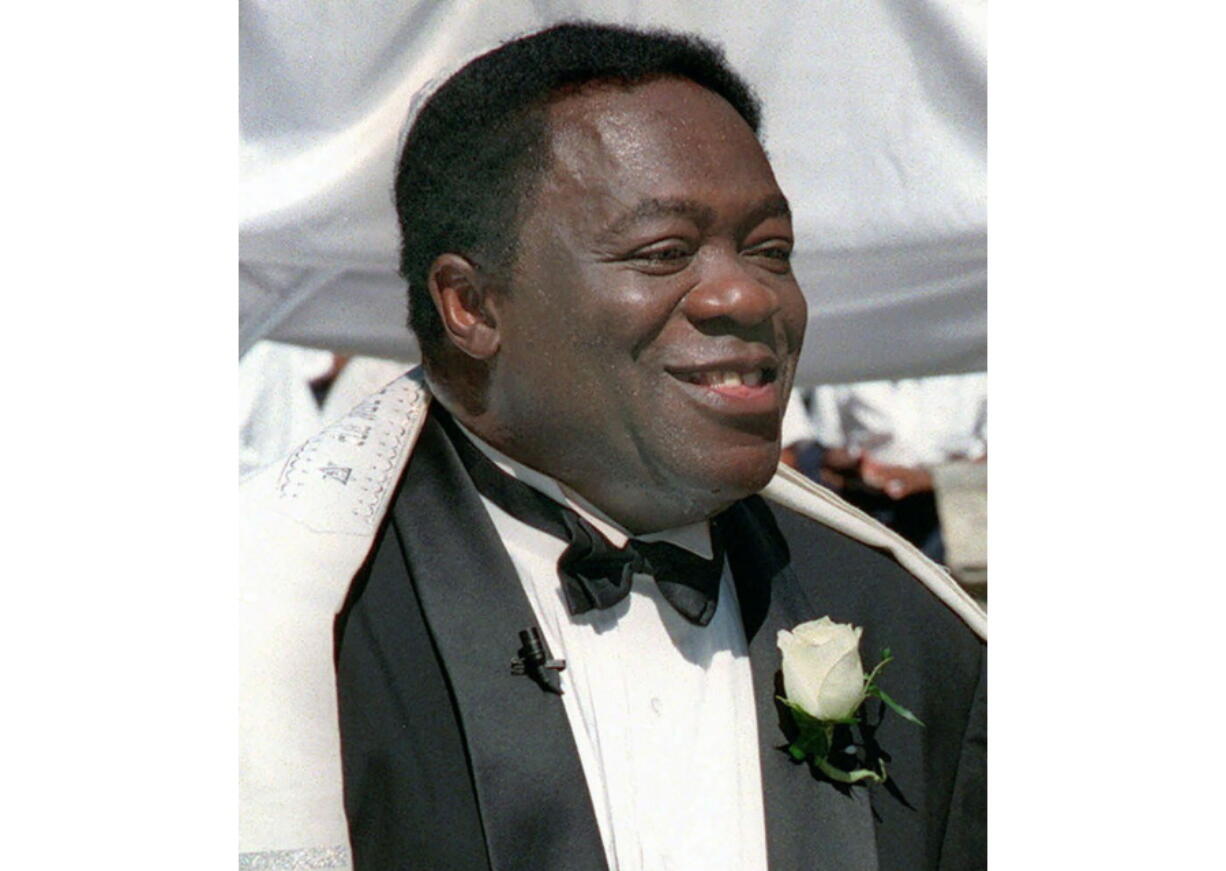 FILE - Actor Yaphet Kotto appears on his wedding day in Baltimore, Md. on July 12, 1998. Kotto, the commanding actor of the James Bond film &quot;Live and Let Die&quot; and as Lt. Al Giardello on the 90&#039;s NBC police drama &quot;Homicide: Life on the Street, died Monday, March 15, 2021 at age 81. Kotto&#039;s wife, Tessie Sinahon, announced his death Monday in a Facebook post. She said he died Monday in the Philippines. Kotto&#039;s agent, Ryan Goldhar, confirmed Kotto&#039;s death.