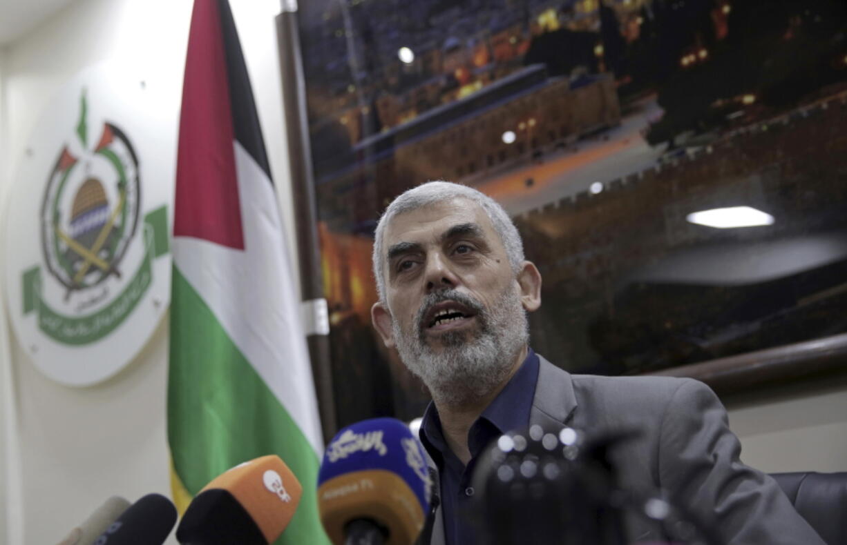 FILE - In this May 10, 2018 file photo, Yehiyeh Sinwar, the Hamas militant group&#039;s leader in the Gaza Strip, speaks to foreign correspondents, in his office in Gaza City. A Hamas official said Wednesday,March 10, 2021, that Sinwar has been re-elected as the group&#039;s top official in its Gaza Strip stronghold. Sinwar, who is close to the group&#039;s hardline militant wing, fended off a challenge by Nizar Awadallah, one of its founders.