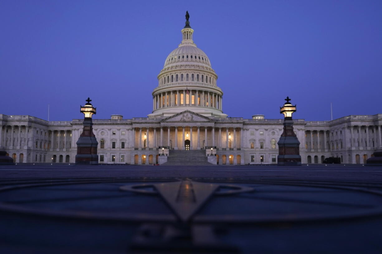 FILE - In this March 5, 2021, file photo The Capitol is seen just before sunrise in Washington. The state across the South are the center of the upcoming once-a-decade redistricting battle. The region is the fastest-growing in the country and as a result will be adding an estimated half-a-dozen House seats.