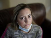 Maura Wozniak poses for a picture on Tuesday, Feb. 23, 2021, in Huntersville, N.C. Wozniak, a 42-year-old mother of 2 has cystic fibrosis and also has undergone lung transplants and has been moved into group 4, just ahead of the general public receive the COVID-19 vaccination.