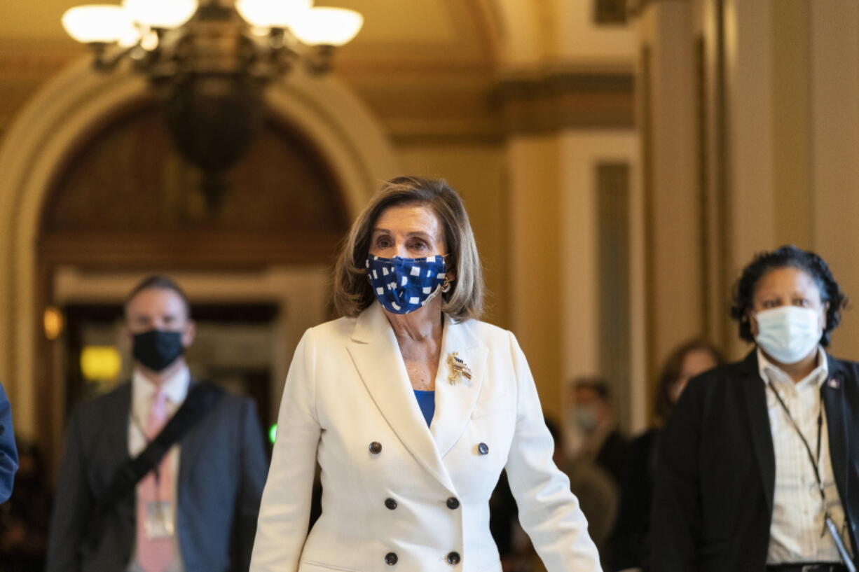 House Speaker Nancy Pelosi of Calif., walks from the House floor, during the vote on the Democrat&#039;s $1.9 trillion COVID-19 relief bill, on Capitol Hill, Wednesday, March 10, 2021, in Washington.