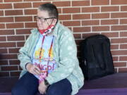 Pat Brown waits outside the Don Bosco Senior Center in Kansas City, Mo., Wednesday, March 3, 2021. Brown knows she needs the vaccine because her asthma and diabetes put her at higher risk of serious COVID-19 complications. But Wall hasn&#039;t attempted to schedule an appointment and didn&#039;t even know if they were being offered in her area yet; she says she is too overwhelmed.