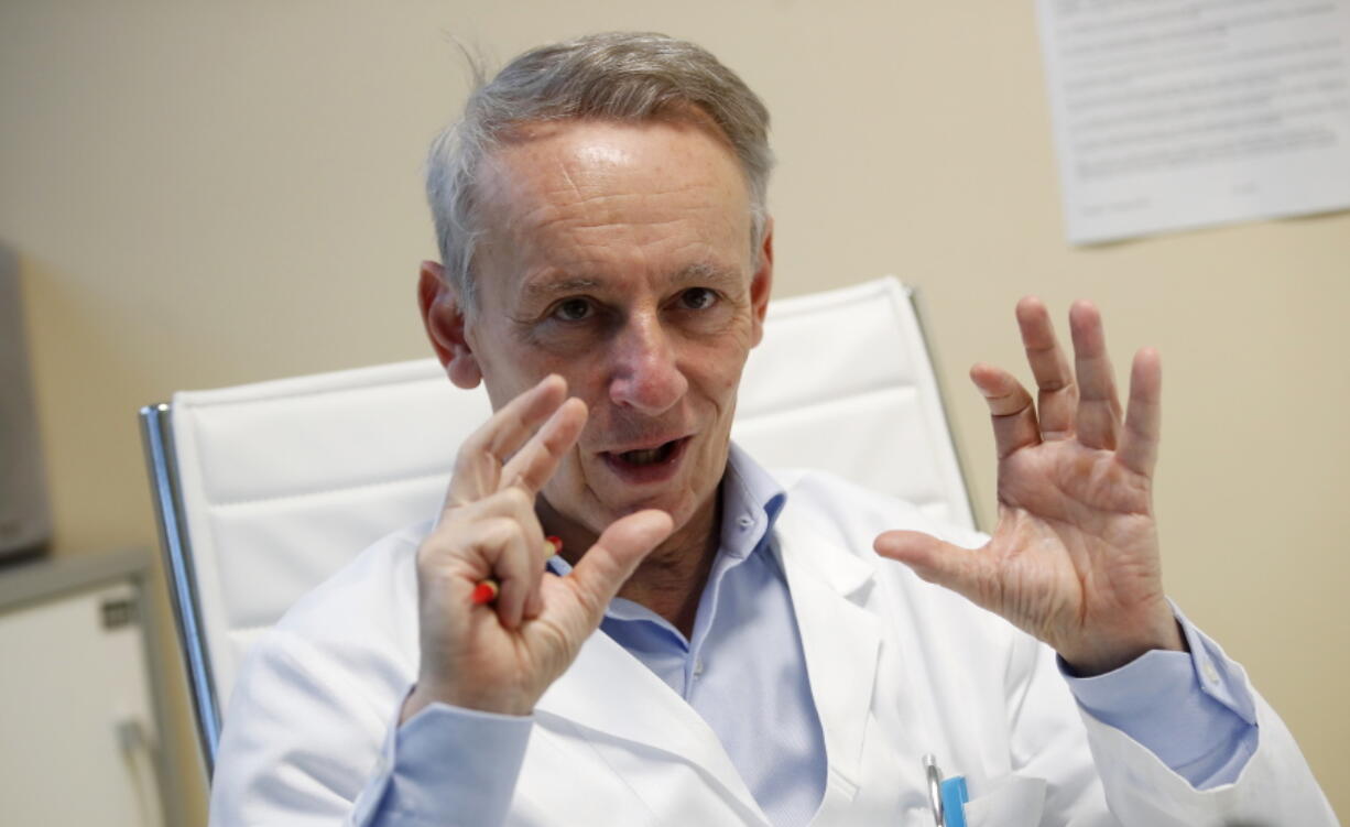 Dr. Luca Lorini, head of intensive care at the hospital named for the mid-20th Century pope Papa Giovanni XXIII, speaks during an interview Thursday in Bergamo, Italy.