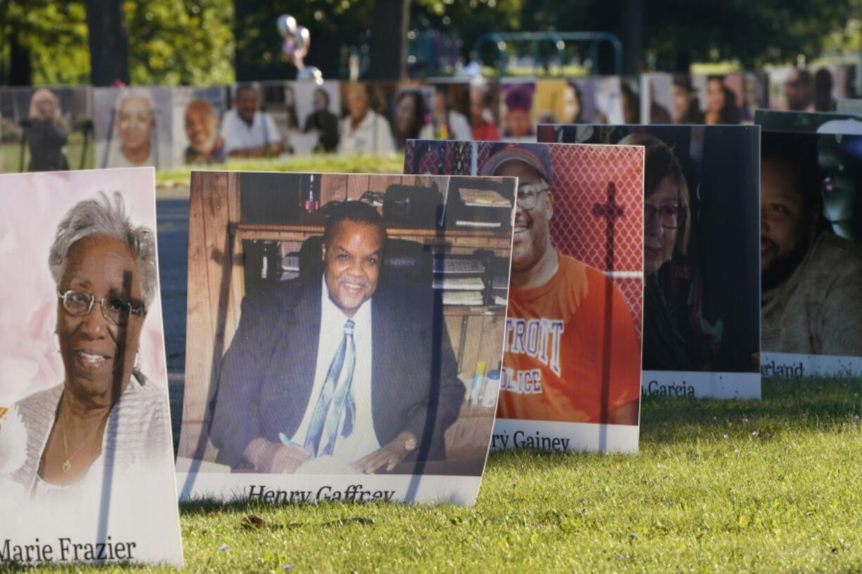 FILE - In this Monday, Aug. 31, 2020 file photo, some of the nearly 900 large poster-sized photos of Detroit victims of COVID-19 are displayed on Belle Isle in Detroit. The COVID-19 pandemic pushed total U.S. deaths last year beyond 3.3 million, the nation&#039;s highest-ever annual death toll, the government reported Wednesday, March 31, 2021.