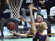 Gonzaga forward Drew Timme (2) lays up the ball against Saint Mary&#039;s the during the first half in West Coast Conference semifinals Monday in Las Vegas.