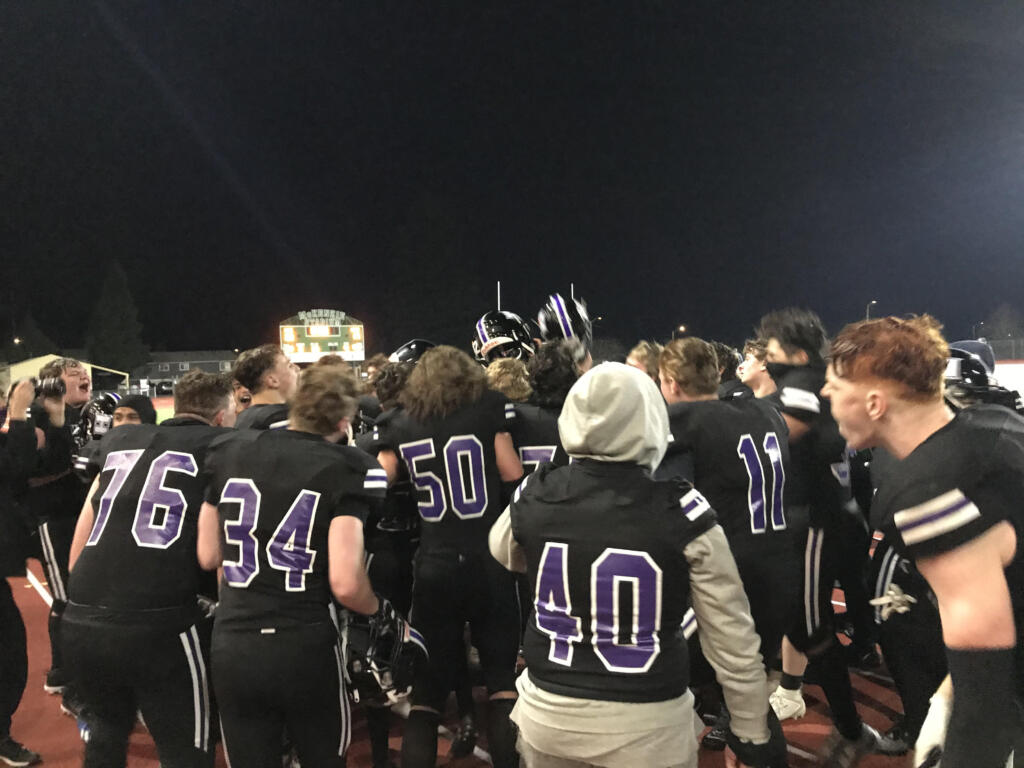 Heritage players celebrate their 30-17 win Friday night at McKenzie Stadium.