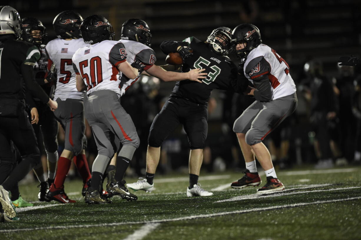 Woodland's Gavin Belleisle carries the ball against R.A.