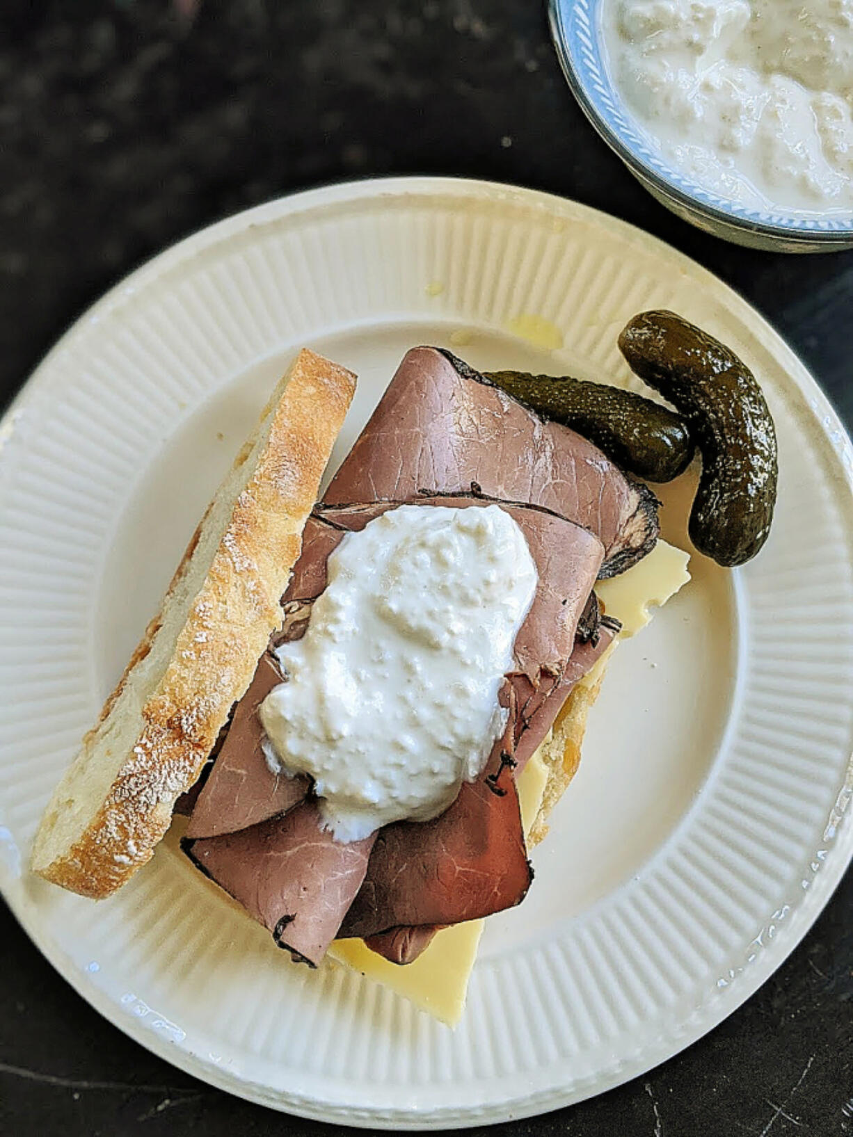 When mixed with sour cream, mayo and vinegar, grated horseradish root makes a spicy sauce for roast beef sandwiches.