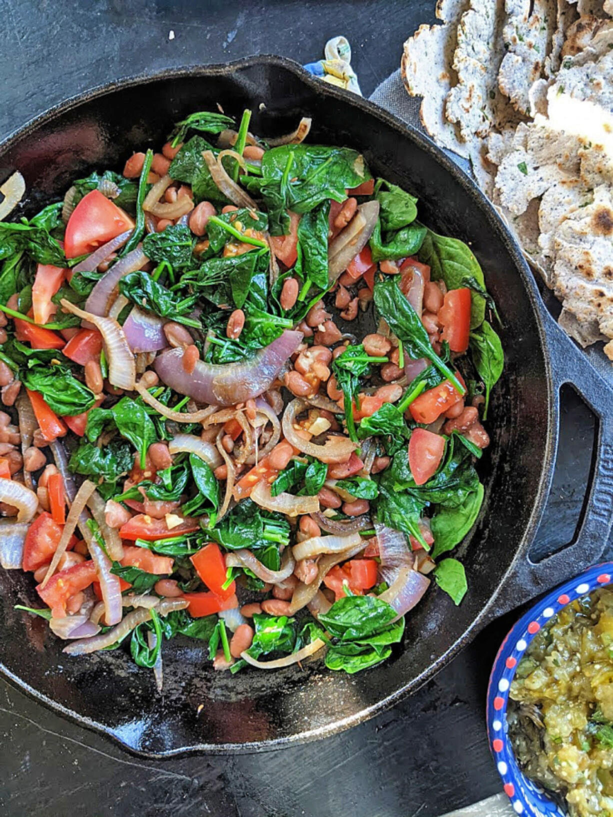 Pinto greens and beans, in this case, spinach, is a Hispanic take on a favorite Pittsburgh Italian dish.