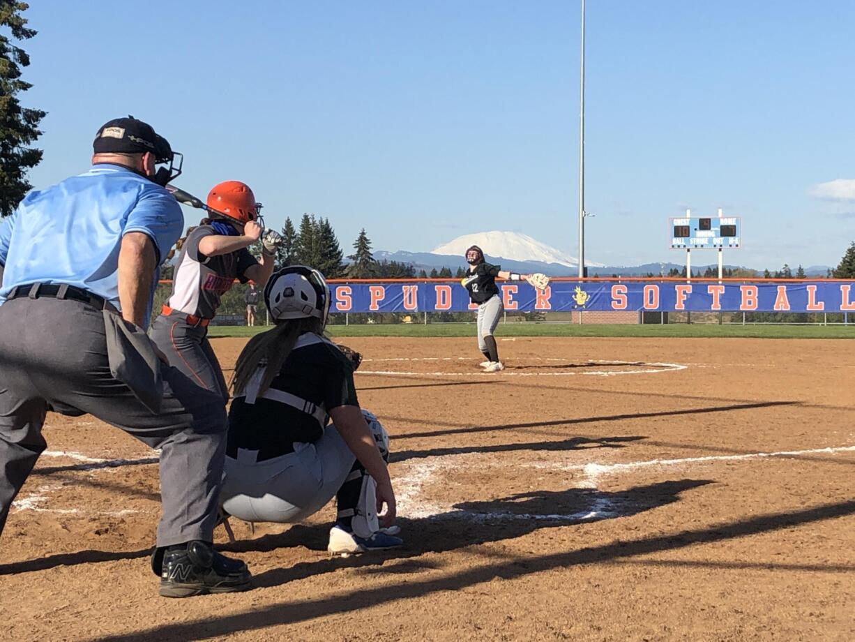 Ridgefield's Makayla Ferguson awaits a pitch from Woodland's Gabi Silveria during a softball game Wednesday at Ridgefield High School. Ridgefield won 15-14.