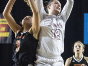 Prairie's Brooke Walling beats Kamiakin's Symone Brown to a rebound during the 3A Hardwood Classic at the Tacoma Dome on Friday March 1, 2019.