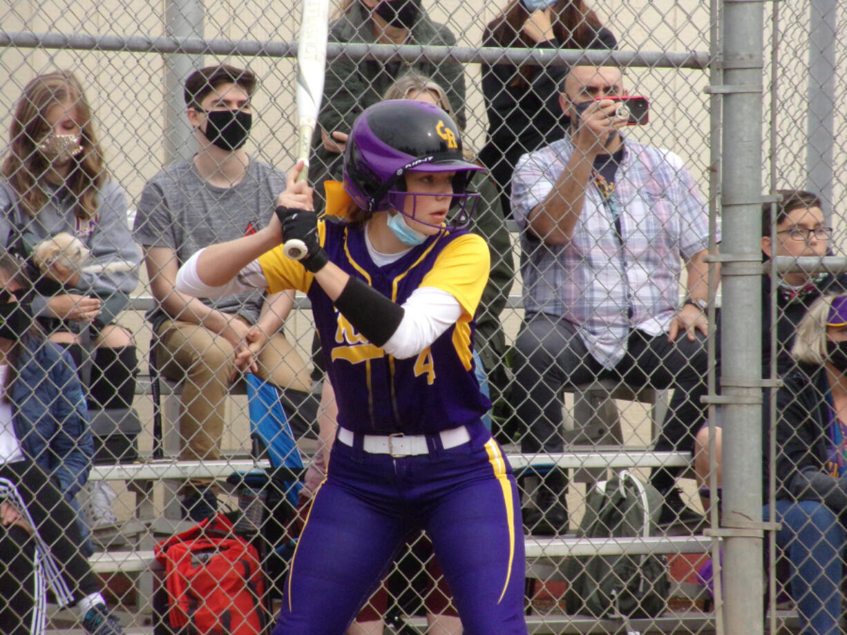 Columbia River's Sophie Reyes awaits the pitch during the third inning Friday against Woodland. She would hit a three-run home run later in the at-bat.