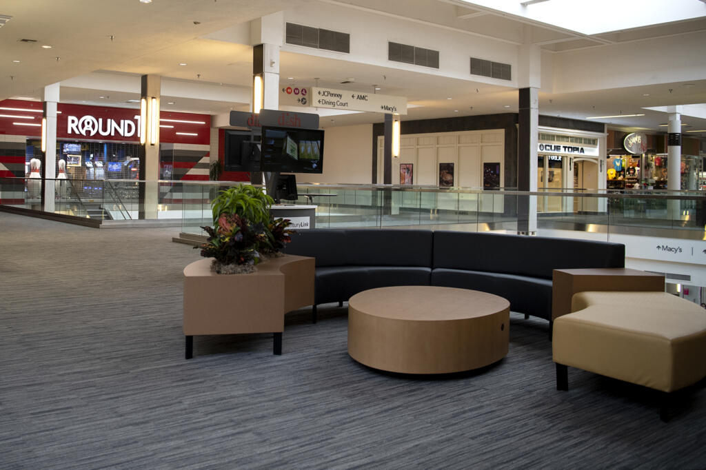 A new seating area sits empty in front of Round 1, which opens this weekend, and Cue Topia, which opened recently at Vancouver Mall.